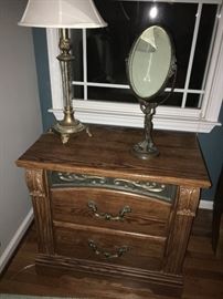 Contemporary bedroom group includes king size bed, dresser with mirror, 2 night stands and clothing armoire.