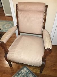 Antique upholstered occasional chair.