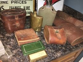 Leather military goods--medicine kit, tool kit, long gun holsters, etc. at least 3 vintage flasks