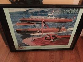 Several boating posters from this annual event, mostly unframed