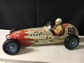 Star of the Show! This Yonezawa 1950s Champion 98 friction race car in hard to find and in excellent condition. It measures 20". It's a must-see.