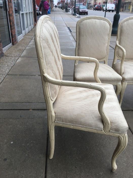 Set of four cream lacquered carved chairs in cream silk, 2 arm & 2 side chairs included in set 