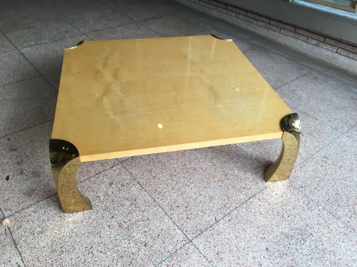 Large blond Birch? lacquered table with brass corner legs