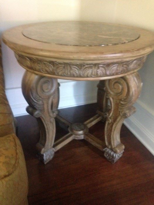 Round carved wood side table w/ brown marble inset top