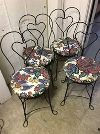 Set of four vintage iron ice cream parlor chairs