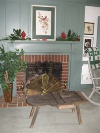         Fireplace fan, andirons, and cobbler's bench