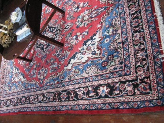                     Persian rug and butler's tray coffee table