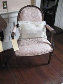                   Carved Louis XVI style open arm chair