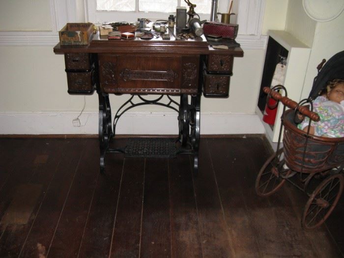  Antique 'Standard' treadle sewing machine cabinet only                                   
                       and antique style doll buggy