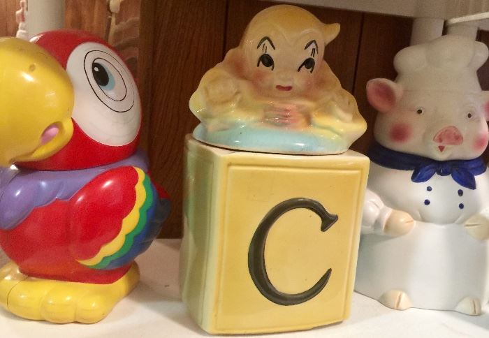 Jack in the box cookie jar, pig, and toucan
