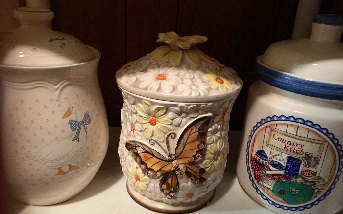 More cookie jars. One with butterfly and daisies