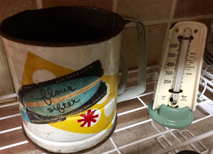 Old flour sifter and thermometer 