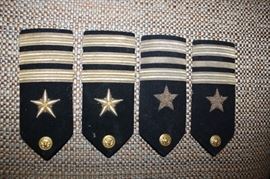 and these Shoulder Boards.  Only the bright set goes with the uniform.   The others are throw ins 