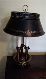 Brass lamp featuring a metal Fleur de Leur Shade.