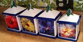 Set of 4 primary color floral canister set. Tiles to match. Very nice
