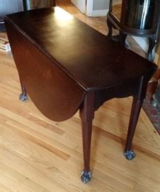 Purchased from an Antique Dealer in England, brought to US with one owner. This beautiful Drop Leaf English Mahogany Table has Ball & Claw Feet.