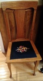 One of six antique dining chairs with needlepoint cushion seat inserts. Very nice set.