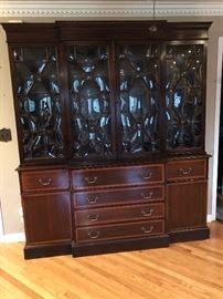 Antique English Breakfront Library Cabinet, 86” tall x 76” wide x 17” deep, dated 1820-1880 with a drop down Secretarial Desk. This gorgeous piece features the rare “Bubble” Glass front. Great condition with loads of storage. Has original Skeleton Key.