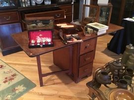 Handmade in St. Elmo, TN, this unique Drop Leaf Gate Table. one-of-a-kind with 3 drawers on each side with a total of 6 drawers for storage. Great for two or 6 people.