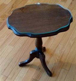 Small wood pedestal table with custom cut glass top