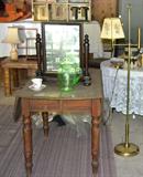 Dresser top mirror, vaseline glass pitcher, lamps, china, and vintage doll house.