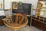 Rear projection TV, dresser, brass headboard, papasan chair, room dehumidifier.