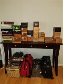 Extensive collection of Cigar Boxes. Random Travel asscescories.  Sofa table!