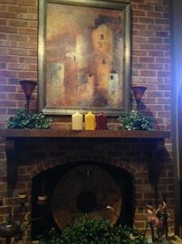 Framed art and fireplace decor