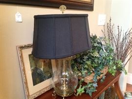 This glass lamp will enhance any surface.