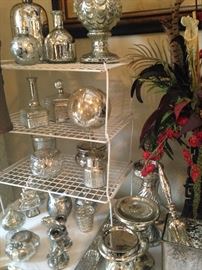 Mercury glass collection  - Mercury glass, or silvered glass, is glass that was blown double walled, then silvered between the layers with a liquid silvering solution, and sealed.