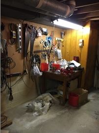 Antique hand saws, vise, Goodyear belts, level 