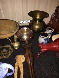 Antique wooden bowl, antique nude nut cracker, brass items, glass red bull, spittoon