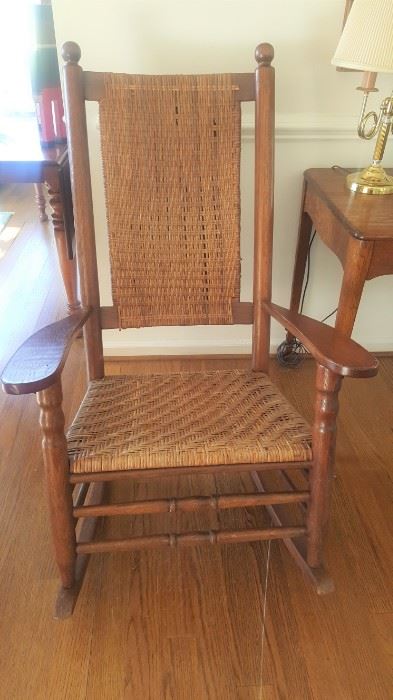 Antique Porch Rocker with rush back and seat