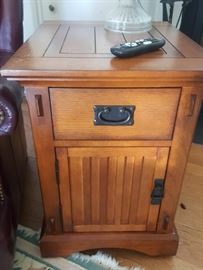 Oak side table with drawer and door