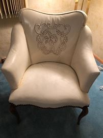 1 of a pair of Vintage leather with stitched decoration chairs