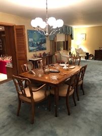 Dining room table, 6 chairs & a buffet