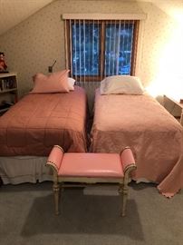 Pair of newer twin mattresses on metal frames