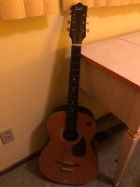 It's nine o'clock on a Saturday... The Regular crowd shuffles in, There's an old man sitting next to me, making love to his tonic and gin