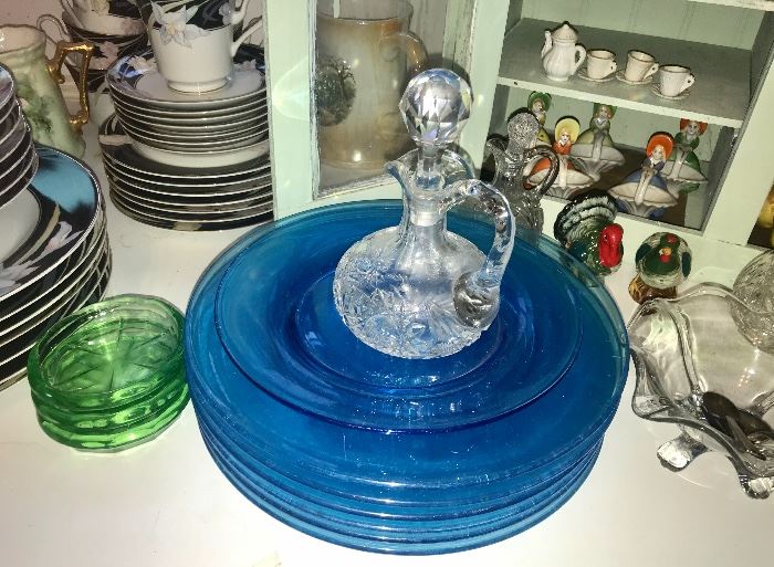 Blue plates and oil decanter 