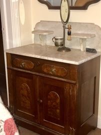 Extraordinary Wash stand with marble top and candle holders on each side