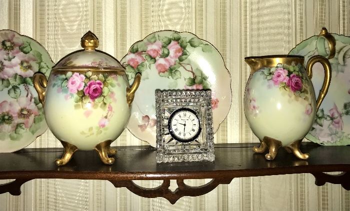 Richly hand painted plates, sugar and creamer and Waterford clock