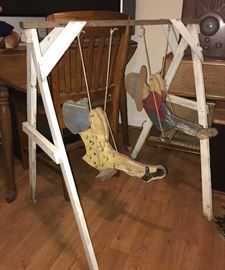 Large hand made wood swing w/ boy and girl swingers 