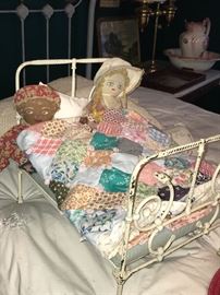 Vintage wrought iron doll's bed