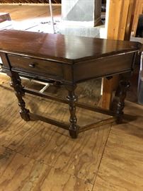 Solid demilune table