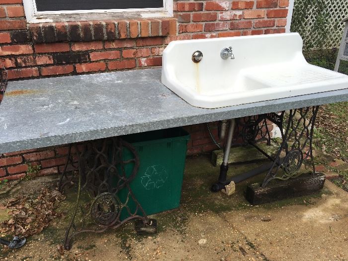 Super Cool Farm Sink on  Vintage Iron Sewing Machine Legs 
   Great for Outdoos and Cleaning Game and Fish