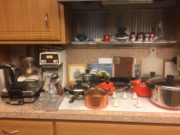 Many appliances and pots, pans everything  as new condition.