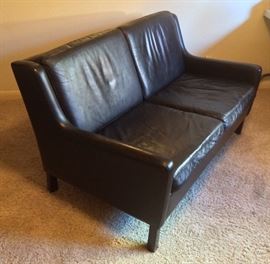 Black leather loveseat (49"L, 32"D, 27.5"H at back)