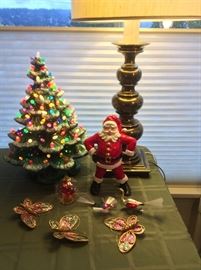 Lighted 18" ceramic Xmas tree, ceramic Santa, bird ornaments with spun glass tails, vintage clip-on butterfly ornaments (Japan), brass Stiffel lamp behind