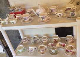 Cups & saucers by Paragon, Royal Albert, Rosina & more (several with violets), also creamers & sugars