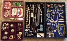Vintage & newer costume jewelry including rhinestones, Xmas pins & earrings, sterling charm bracelet, sterling chains & earrings, ladies watches, glass bead necklaces. Makers include Bogoff, La Roca, Trifari & more